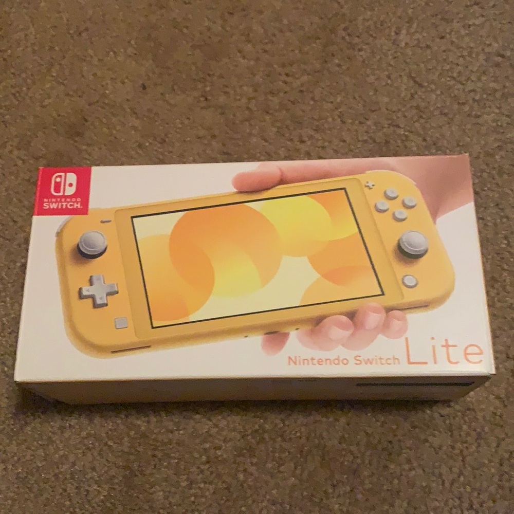 Yellow Nintendo switch lite (BRAND NEW!!)